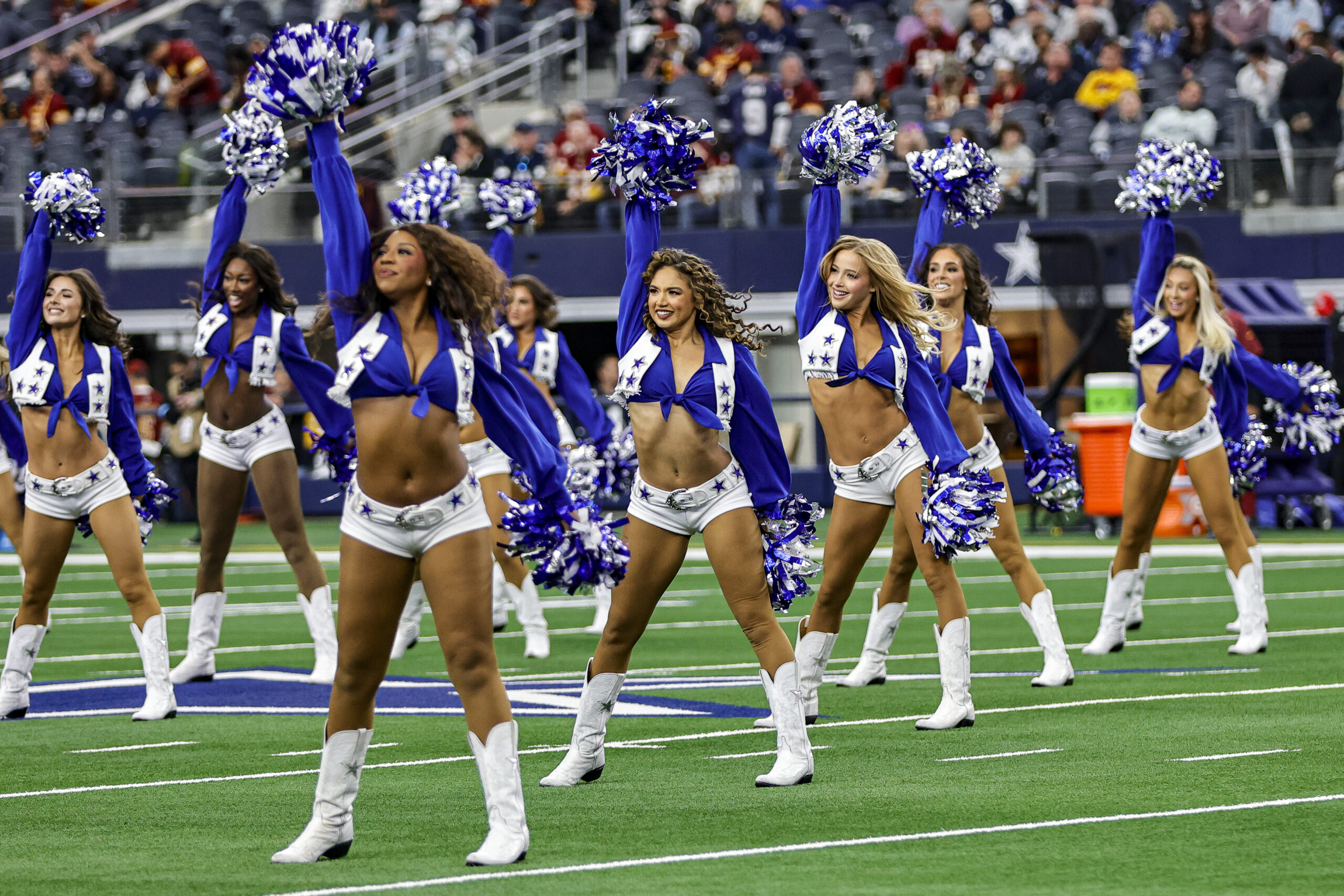 ARLINGTON, TX - JANUARY 05: The Dallas Cowboys Cheerleaders cheer during the game between the Dallas Cowboys and the Washington Commanders on January 5, 2025 at AT&T Stadium in Arlington, Texas. (Photo by Matthew Pearce/Icon Sportswire via Getty Images)