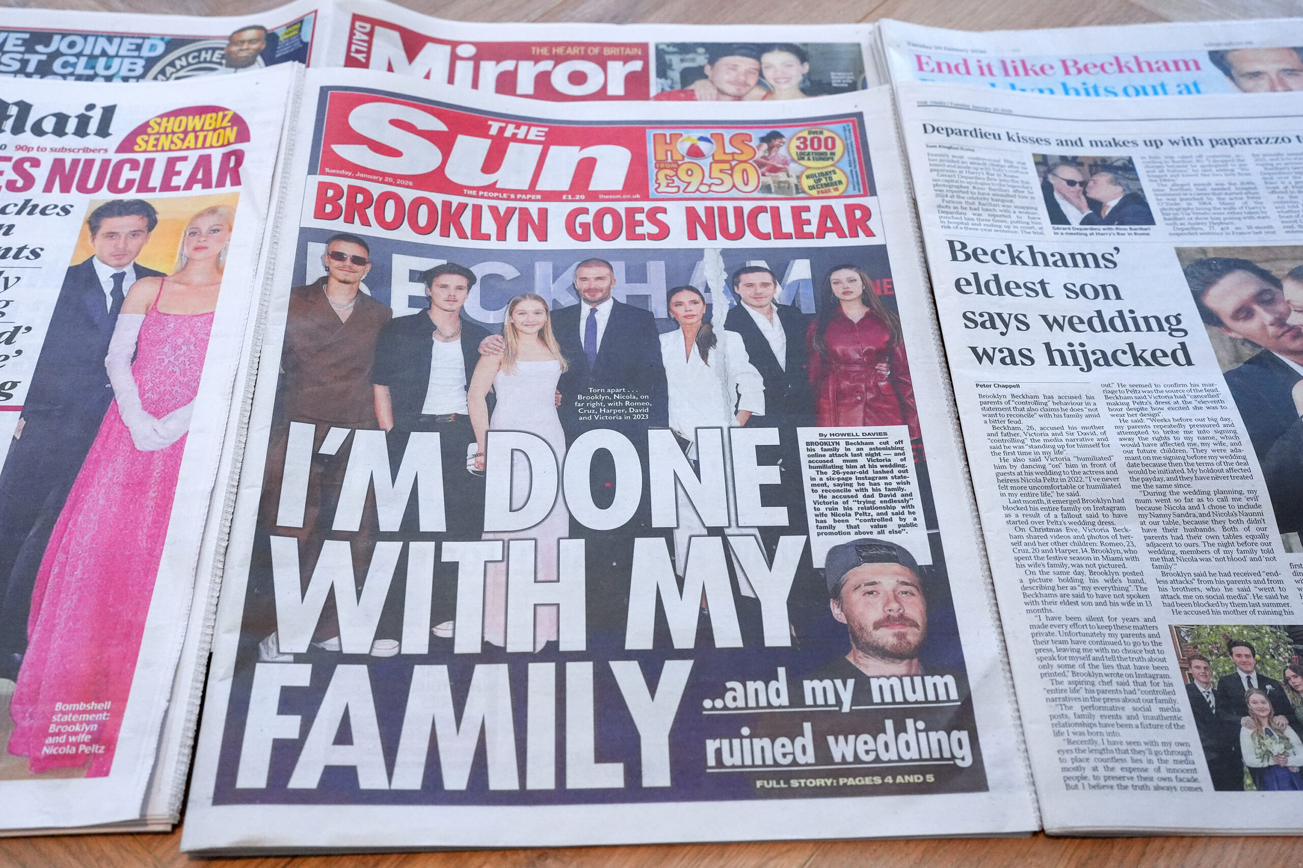 In this photo illustration, U.K. newspaper front pages display stories and images on the Beckham family feud on Jan. 20, 2026,