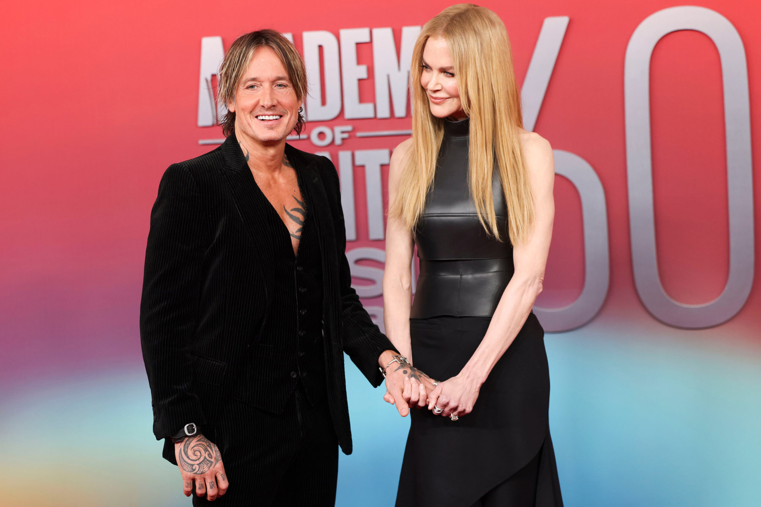 Keith Urban, left, and Nicole Kidman arrive on the red carpet
