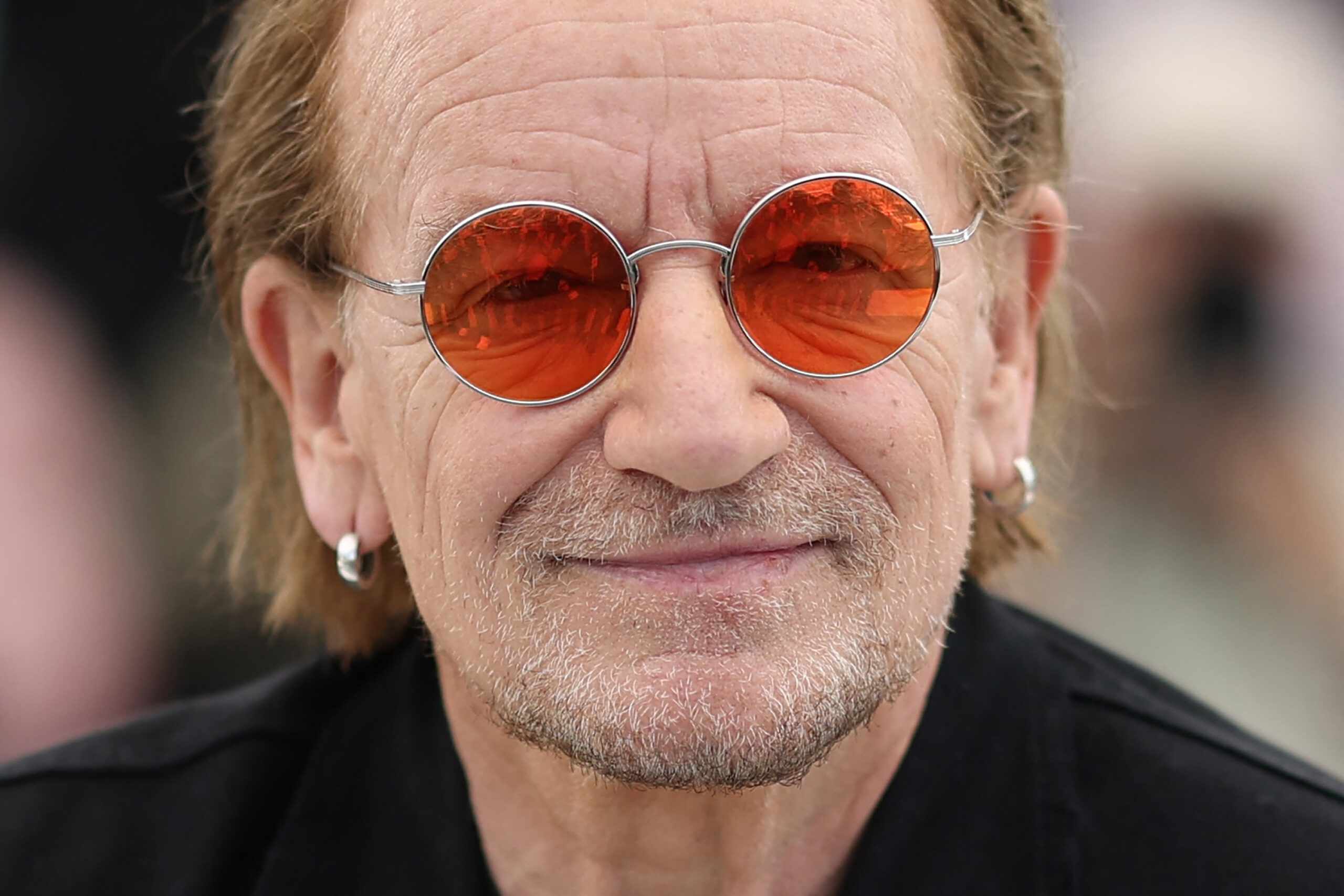 Irish singer Bono of U2 poses during a photocall for the film "Bono: