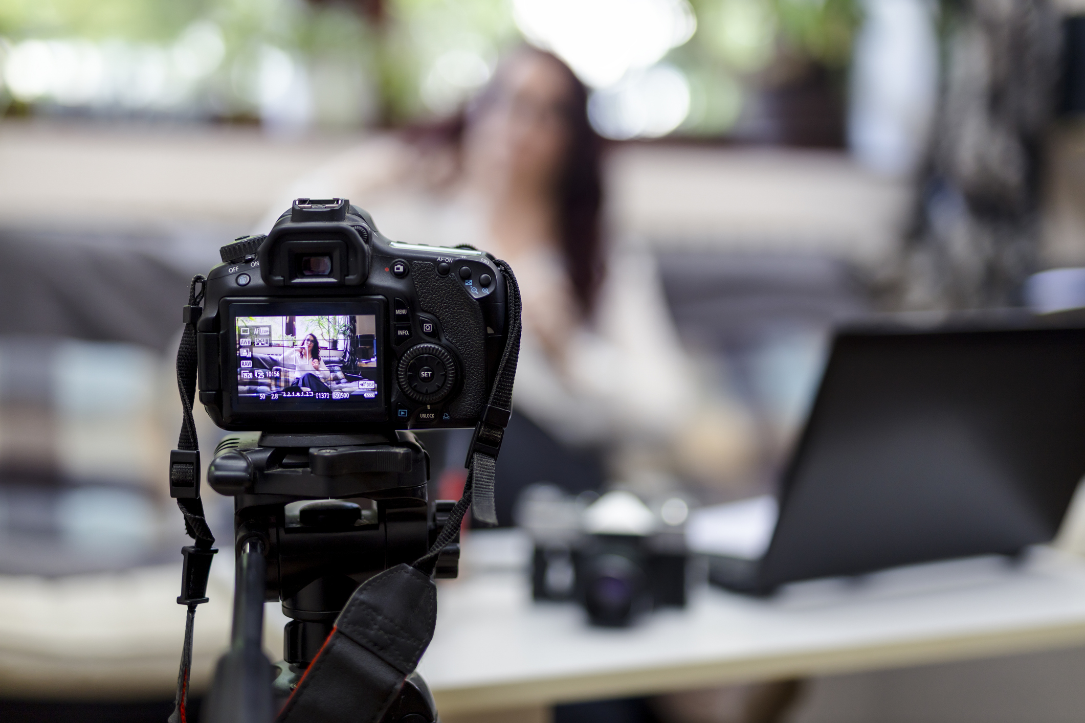 A teacher recording online lessons for photography. Showing various aspects of photography for students.